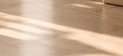 Sunlight across the floor of an empty home