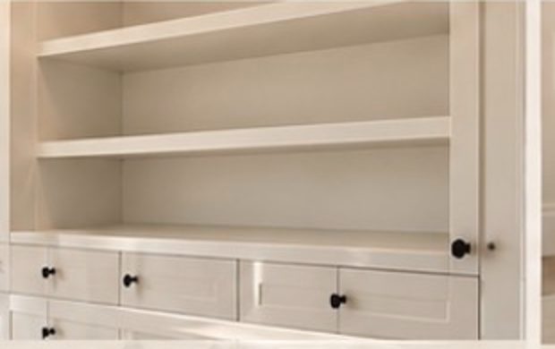 Empty built-in cabinets and shelving
